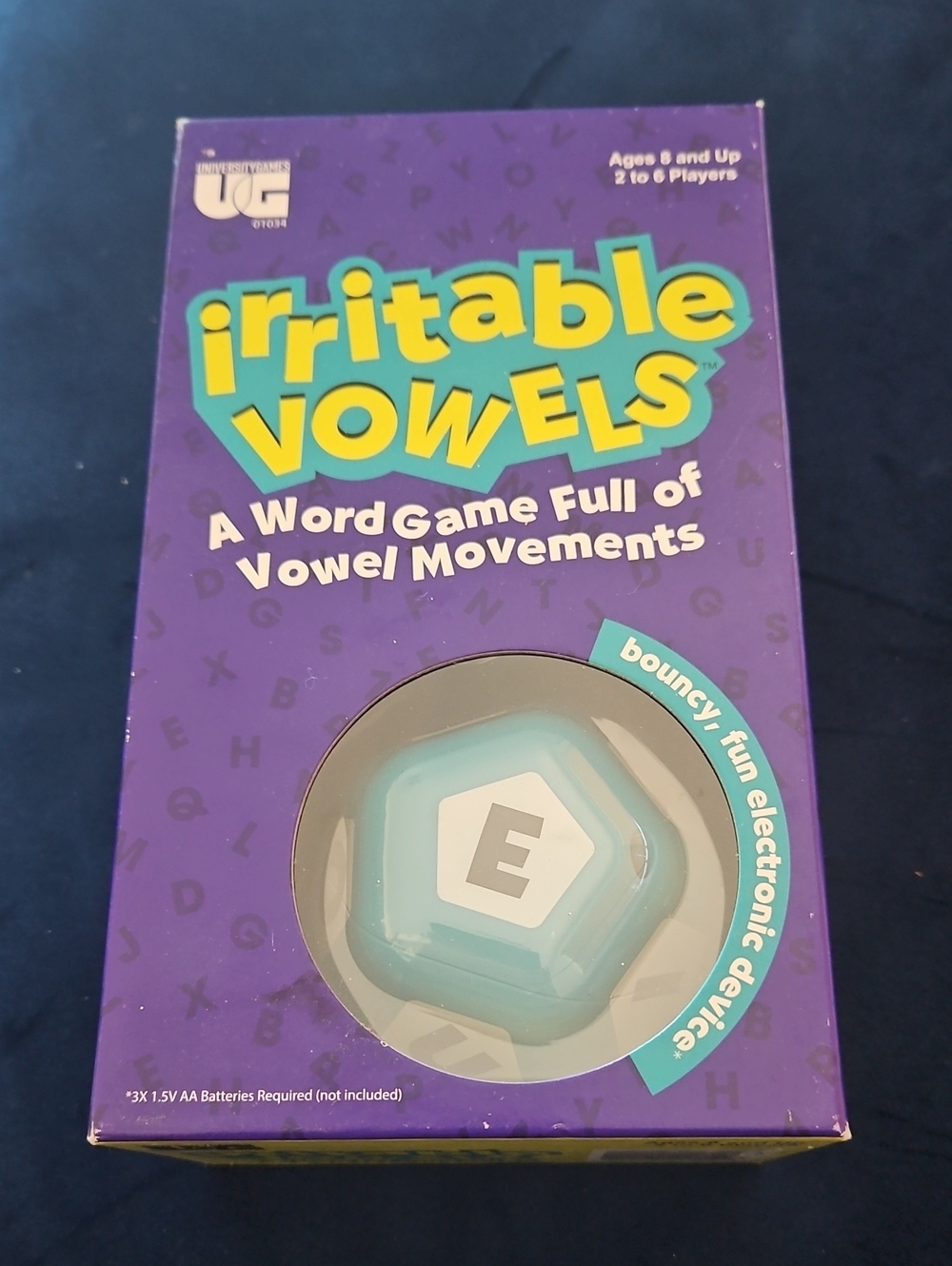 Irritable Vowels Electronic Word Game - Purple Box, Teal Token